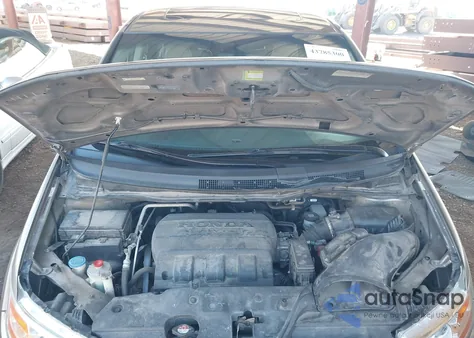 2012 Honda Odyssey Touring/Touring Elite from USA, damaged, VIN 5FNRL5H9XCB140822